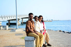 Ahil-Siva-Acharya-Kriyanandamayi-and-Devika-in-Jaffna-by-water (click image to enlarge)